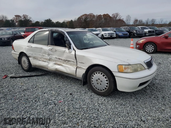1996 Acura RL with VIN JH4KA9652TC000077, listed as a Copart auction lot 82430394 with 201,807 mi miles and Salvage Title. Bid and sale history available at carsss.com. Image 4.
