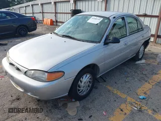 1999 Ford Escort SE z VIN 1FAFP13P6XW200107, wystawiony jako IAAI lot #42600719 z przebiegiem 113 515 mil mil oraz . Historia ofert i sprzedaży dostępna na DreamBid. Obrazek 17.
