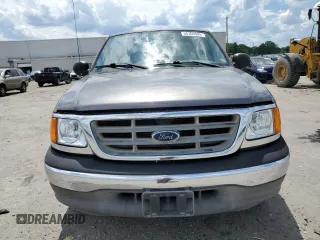 2004 Ford F-150 XL with VIN 2FTRX17274CA98376, listed as a Copart auction lot 56300585 with 71,767 mi miles and Salvage title. Bid and sale history available at DreamBid. Image 5.
