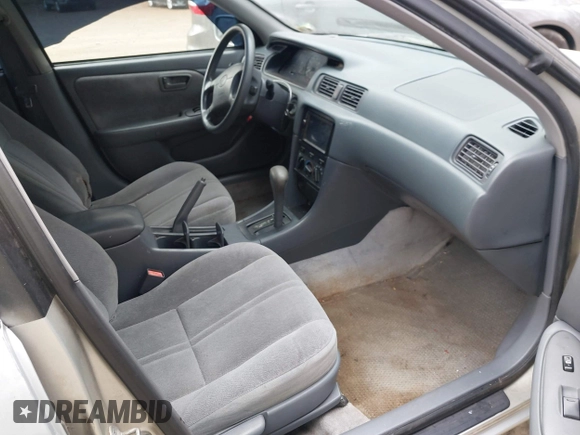 2000 Toyota Camry CE with VIN 4T1BG22K3YU715773, listed as a IAAI auction lot 40790259 with 202,717 mi miles and . Bid and sale history available at carsss.com. Image 5.