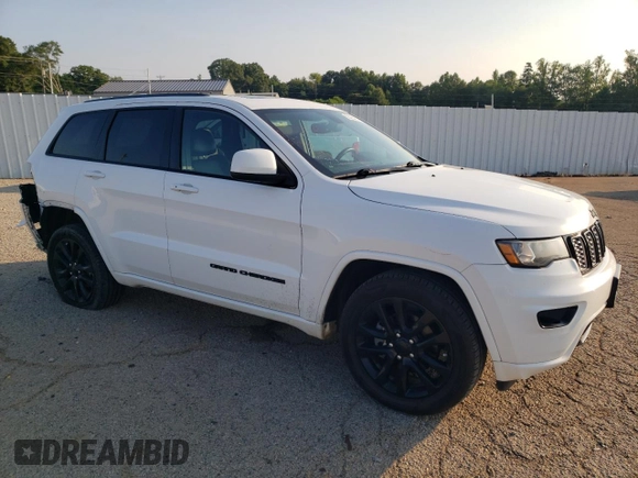 2017 Jeep Grand Cherokee Altitude with VIN 1C4RJEAG9HC702812, listed as a Copart auction lot 62423495 with 162,982 mi miles and Salvage title. Bid and sale history available at DreamBid. Image 4.