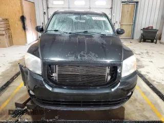 2011 Dodge Caliber Mainstreet with VIN 1B3CB3HA2BD106288, listed as a Copart auction lot 53635615 with 127,599 mi miles and Salvage Title. Bid and sale history available at carsss.com. Image 5.