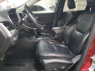 2015 Jeep Cherokee Trailhawk z VIN 1C4PJMBS9FW509642, wystawiony jako Copart lot #52385555 z przebiegiem 135 477 mil mil oraz Szkoda całkowita • Salvage title. Historia ofert i sprzedaży dostępna na DreamBid. Obrazek 7.