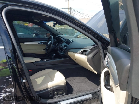 2021 Cadillac CT5 Luxury z VIN 1G6DX5RKXM0146235, wystawiony jako IAAI lot #42214676 z przebiegiem 72 847 mil mil oraz . Historia ofert i sprzedaży dostępna na DreamBid. Obrazek 5.