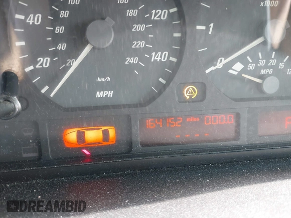 2000 BMW 3 Series 323Ci with VIN WBABM3347YJN84185, listed as a IAAI auction lot 41503159 with 164,152 mi miles and . Bid and sale history available at DreamBid. Image 7.