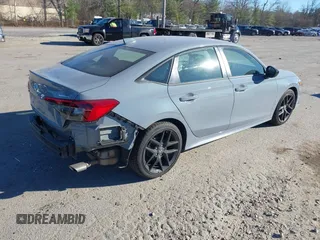 2022 Honda Civic Sport z VIN 2HGFE2F50NH601567, wystawiony jako IAAI lot #40880687 z przebiegiem 16 587 mil mil oraz . Historia ofert i sprzedaży dostępna na DreamBid. Obrazek 4.