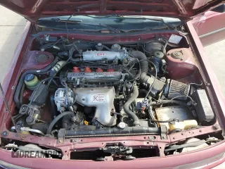 1991 Toyota Camry DLX z VIN 4T1SV21E7MU414824, wystawiony jako Copart lot #61604434 z przebiegiem 170 867 mil mil oraz Szkoda całkowita • Salvage title. Historia ofert i sprzedaży dostępna na DreamBid. Obrazek 13.