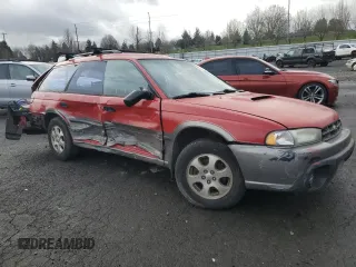 1999 Subaru Legacy Outback with VIN 4S3BG6853X7606482, listed as a Copart auction lot 47055385 with 145,079 mi miles and Salvage title. Bid and sale history available at DreamBid. Image 4.