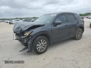 2016 Mazda CX-5 Touring with VIN JM3KE2CY9G0899787, listed as a Copart auction lot 50790365 with 31,294 mi miles and Salvage Title. Bid and sale history available at carsss.com. Image 1.