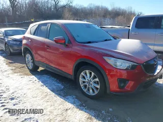 2015 Mazda CX-5 Grand Touring with VIN JM3KE4DY0F0538246, listed as a IAAI auction lot 41629662 with 87,788 mi miles. Bid and sale history available at carsss.com. Image 1.