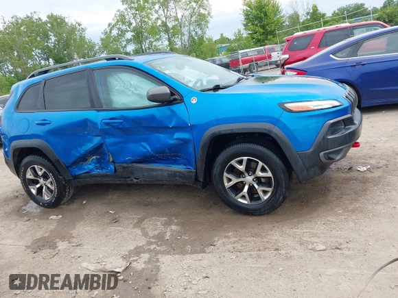 2017 Jeep Cherokee Trailhawk with VIN 1C4PJMBS2HW612792, listed as a IAAI auction lot 42373828 with 74,106 mi miles and . Bid and sale history available at DreamBid. Image 13.