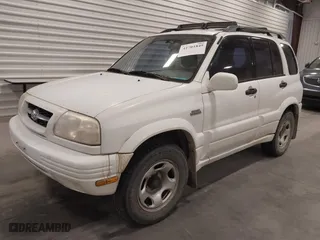 2000 Suzuki Grand Vitara JLX with VIN JS3TD62VXY4130242, listed as a IAAI auction lot 41701849 with 106,700 mi miles. Bid and sale history available at carsss.com. Image 2.