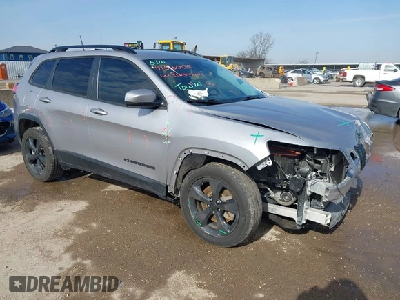 2021 Jeep Cherokee Altitude with VIN 1C4PJLLB6MD112830, listed as a IAAI auction lot 41560135 with 76,760 mi miles. Bid and sale history available at carsss.com. Image 1.