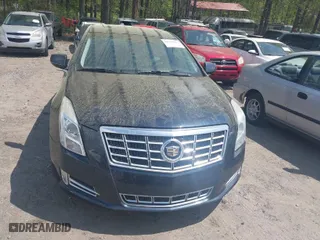 2013 Cadillac XTS Luxury with VIN 2G61P5S36D9214588, listed as a IAAI auction lot 41953947 with 142,204 mi miles. Bid and sale history available at carsss.com. Image 12.