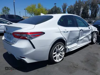 2019 Toyota Camry LE z VIN 4T1B11HK6KU754349, wystawiony jako IAAI lot #42262271 z przebiegiem 77 312 mil mil oraz . Historia ofert i sprzedaży dostępna na DreamBid. Obrazek 6.