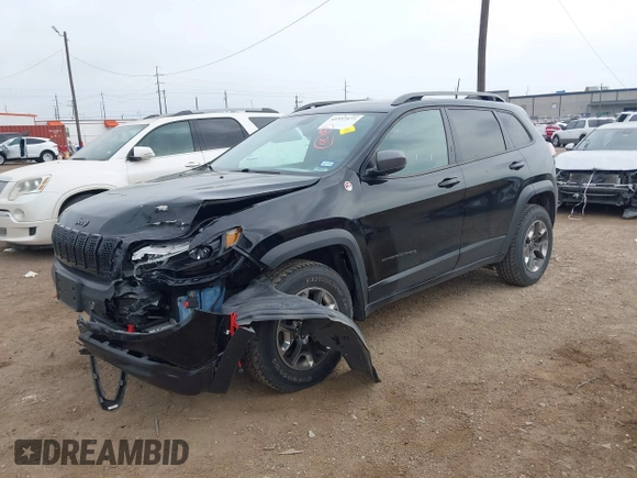 2019 Jeep Cherokee Trailhawk Elite with VIN 1C4PJMBX4KD385796, listed as a IAAI auction lot 41557577 with 55,700 mi miles. Bid and sale history available at carsss.com. Image 17.