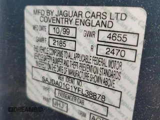 2000 Jaguar S-Type V6 z VIN SAJDA01C1YFL38878, wystawiony jako Copart lot #44323075 z przebiegiem 231 855 mil mil oraz Szkoda całkowita • Salvage title. Historia ofert i sprzedaży dostępna na DreamBid. Obrazek 12.