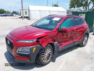 2021 Hyundai Kona SEL with VIN KM8K22AA8MU601480, listed as a IAAI auction lot 39589701 with 55,876 mi miles and . Bid and sale history available at carsss.com. Image 17.
