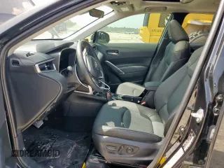 2023 Toyota Corolla Cross XLE with VIN 7MUDAAAG2PV072301, listed as a Copart auction lot 63484815 with 25,017 mi miles and Salvage title. Bid and sale history available at DreamBid. Image 7.