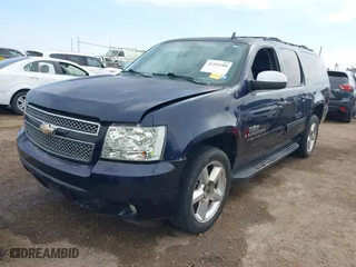 2009 Chevrolet Suburban LT w/2LT with VIN 1GNFC26JX9R280829, listed as a IAAI auction lot 41551580 with 214,351 mi miles. Bid and sale history available at carsss.com. Image 2.