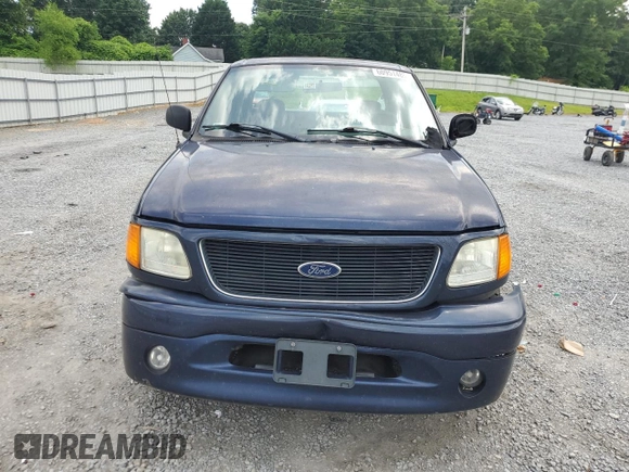 2004 Ford F-150 XL with VIN 2FTRX17234CA91750, listed as a Copart auction lot 60951485 with 243,621 mi miles and Salvage title. Bid and sale history available at DreamBid. Image 5.