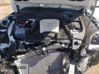 2023 Porsche Cayenne E-Hybrid Hybrid with VIN WP1BE2AY0PDA28473, listed as a Copart auction lot 56708953 with Not provided miles and . Bid and sale history available at DreamBid. Image 12.