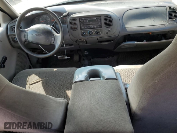 1999 Ford F-150 with VIN 1FTRX18W1XKC00918, listed as a Copart auction lot 53830305 with 205,205 mi miles and Salvage title. Bid and sale history available at DreamBid. Image 8.