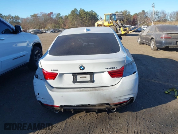 2019 BMW 4 Series 440i xDrive with VIN WBA4J7C57KBM74773, listed as a IAAI auction lot 40770866 with 79,382 mi miles and . Bid and sale history available at carsss.com. Image 16.
