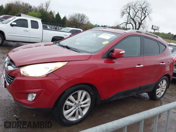 2013 Hyundai Tucson GLS with VIN KM8JU3AC8DU683546, listed as a IAAI auction lot 41956167 with 141,510 mi miles. Bid and sale history available at carsss.com. Image 14.