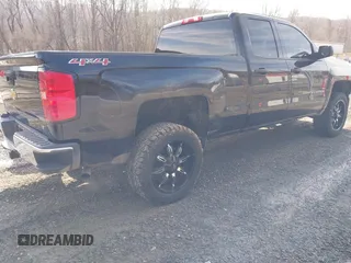 2014 Chevrolet Silverado 1500 LT with VIN 1GCVKREH4EZ338281, listed as a IAAI auction lot 41581754 with 126,786 mi miles and . Bid and sale history available at DreamBid. Image 4.