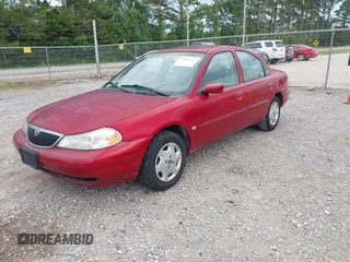1998 Mercury Mystique z VIN 3MELM6537WM600056, wystawiony jako IAAI lot #42305711 z przebiegiem 206 104 mil mil oraz . Historia ofert i sprzedaży dostępna na DreamBid. Obrazek 2.