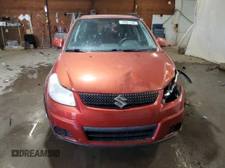 2011 Suzuki SX4 Crossover with VIN JS2YB5A33B6304853, listed as a Copart auction lot 79001134 with 134,041 mi miles and Salvage Title. Bid and sale history available at carsss.com. Image 5.
