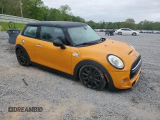 2015 MINI Hardtop S with VIN WMWXP7C52F2A41236, listed as a Copart auction lot 52600215 with 113,536 mi miles and Salvage Title. Bid and sale history available at DreamBid. Image 4.