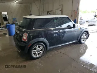 2011 MINI Hardtop with VIN WMWSU3C59BT099759, listed as a Copart auction lot 53995355 with 141,575 mi miles and Salvage Title. Bid and sale history available at DreamBid. Image 3.