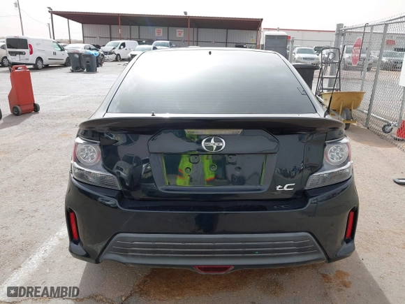 2016 Scion tC with VIN JTKJF5C76GJ017584, listed as a IAAI auction lot 41938981 with 121,166 mi miles. Bid and sale history available at carsss.com. Image 16.