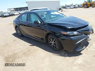 2023 Toyota Camry SE with VIN 4T1G11AK1PU800063, listed as a IAAI auction lot 42121633 with 41,572 mi miles. Bid and sale history available at carsss.com. Image 1.
