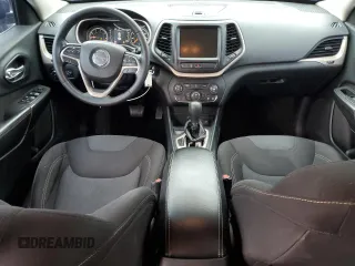 2015 Jeep Cherokee Latitude with VIN 1C4PJLCB6FW766637, listed as a Copart auction lot 53584485 with 128,168 mi miles and Salvage Title. Bid and sale history available at carsss.com. Image 8.