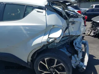 2019 Toyota C-HR XLE z VIN JTNKHMBX3K1029701, wystawiony jako IAAI lot #42023964 z przebiegiem 83 055 mil mil oraz . Historia ofert i sprzedaży dostępna na DreamBid. Obrazek 17.
