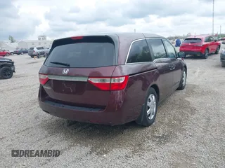 2013 Honda Odyssey LX with VIN 5FNRL5H25DB080209, listed as a IAAI auction lot 42123644 with 157,631 mi miles and . Bid and sale history available at carsss.com. Image 4.