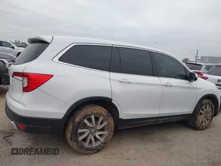2020 Honda Pilot EX-L with VIN 5FNYF5H55LB029238, listed as a IAAI auction lot 41330490 with 116,787 mi miles. Bid and sale history available at carsss.com. Image 13.