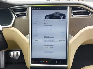 2014 Tesla Model S 60 with VIN 5YJSA1H10EFP30234, listed as a IAAI auction lot 42182249 with 186,654 mi miles and . Bid and sale history available at DreamBid. Image 18.