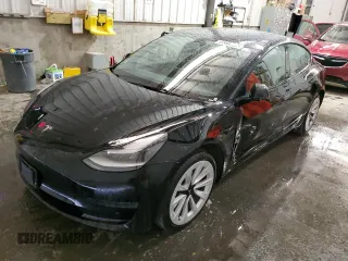 2023 Tesla Model 3 with VIN 5YJ3E1EA8PF451324, listed as a Copart auction lot 88318475 with 74,582 mi miles and Salvage Title. Bid and sale history available at DreamBid. Image 1.