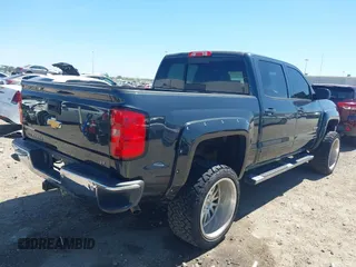 2018 Chevrolet Silverado 1500 LT with VIN 3GCPCREC1JG127396, listed as a IAAI auction lot 41790850 with 138,725 mi miles and . Bid and sale history available at DreamBid. Image 4.