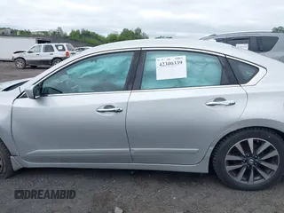 2017 Nissan Altima S z VIN 1N4AL3AP2HC239414, wystawiony jako IAAI lot #42300339 z przebiegiem 98 643 mil mil oraz . Historia ofert i sprzedaży dostępna na DreamBid. Obrazek 14.