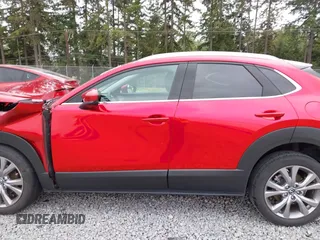 2021 Mazda CX-30 Premium with VIN 3MVDMBDM7MM213754, listed as a IAAI auction lot 42509691 with 61,230 mi miles and . Bid and sale history available at DreamBid. Image 15.