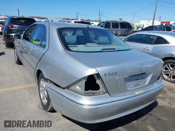 2002 Mercedes-Benz S-Class 5.0L with VIN WDBNG75J52A312063, listed as a IAAI auction lot 41818901 with 191,729 mi miles. Bid and sale history available at carsss.com. Image 6.