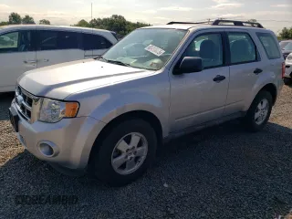 2011 Ford Escape XLS with VIN 1FMCU0C77BKB10475, listed as a Copart auction lot 65480065 with 90,760 mi miles and Clean title. Bid and sale history available at DreamBid. Image 1.