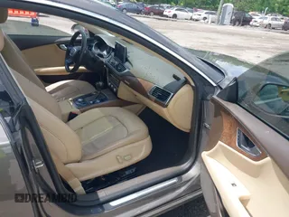 2012 Audi A7 Premium Plus with VIN WAUYGAFC1CN085666, listed as a IAAI auction lot 42177867 with 242,775 mi miles and . Bid and sale history available at DreamBid. Image 5.