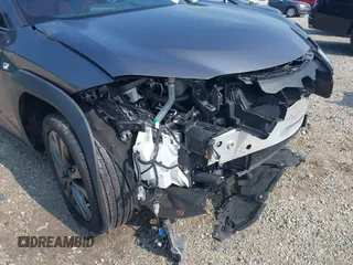 2021 Lexus UX 250h F Sport z VIN JTHE9JBHXM2045377, wystawiony jako IAAI lot #42580566 z przebiegiem 52 838 mil mil oraz . Historia ofert i sprzedaży dostępna na DreamBid. Obrazek 6.