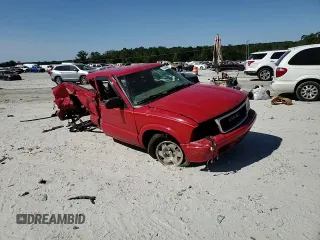 2003 GMC Sonoma SLS z VIN 1GTCS19X138192032, wystawiony jako Copart lot #76230394 z przebiegiem 116 046 mil mil oraz Szkoda całkowita • Salvage title. Historia ofert i sprzedaży dostępna na DreamBid. Obrazek 11.